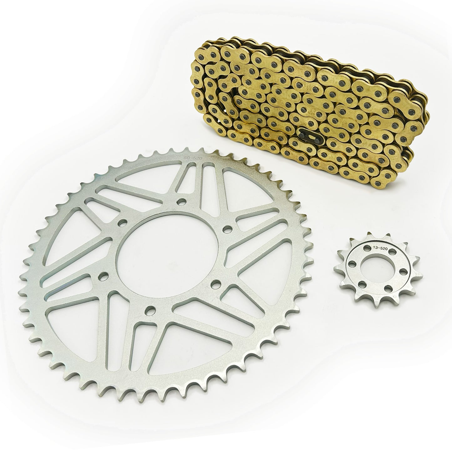Large silver rear sprocket with small silver front sprocket and gold chain with master link